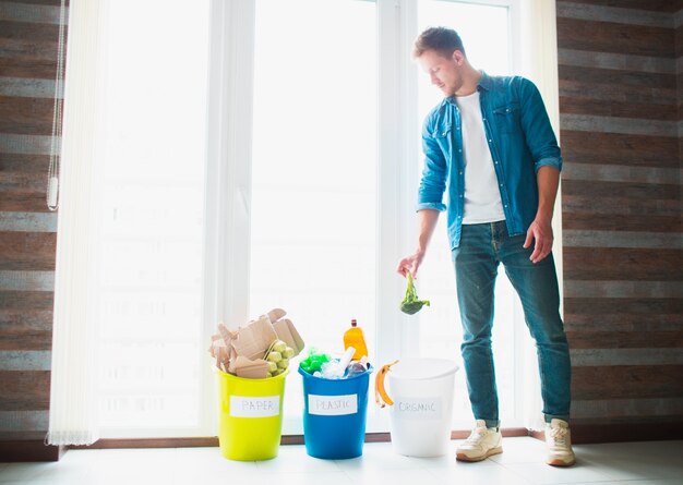 close up concept sort garbage home there are three buckets different types garbage guy sorts waste kitchen 186523 1429