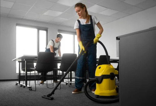 Cleaner removing dust and debris after home renovation in Essex